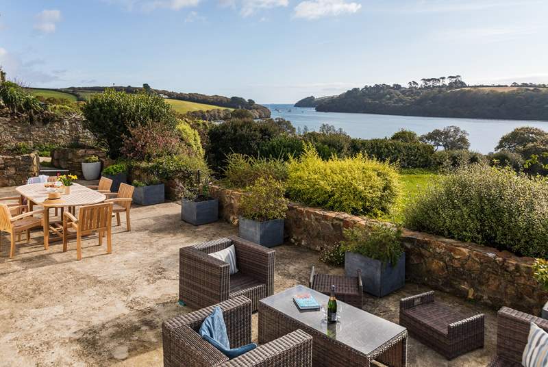 The sunny terrace makes the most of the stunning outlook.
