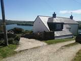The private drive is to the left of White Cottage, even the drive has a view.