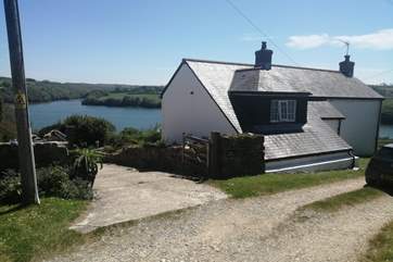 The private drive is to the left of White Cottage, even the drive has a view.