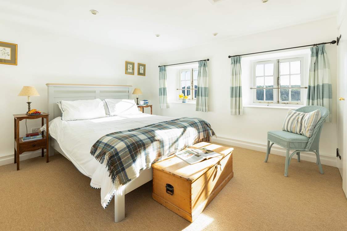 The light main bedroom with a lovely outlook.