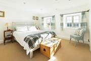 The light main bedroom with a lovely outlook.