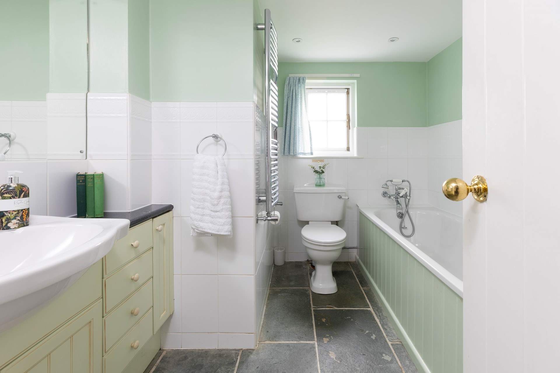 There is a family bathroom on the ground floor with a bath and separate shower. 