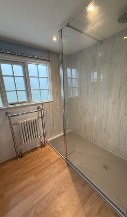 The main bedroom has a fabulous en-suite shower room.