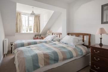 The third bedroom has twin beds.