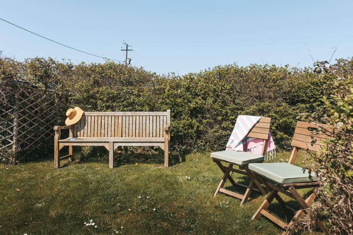 Enjoy the views from the small garden which is accessed up steep granite steps.