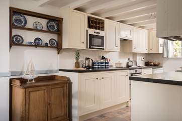 The kitchen is flooded with natural light.