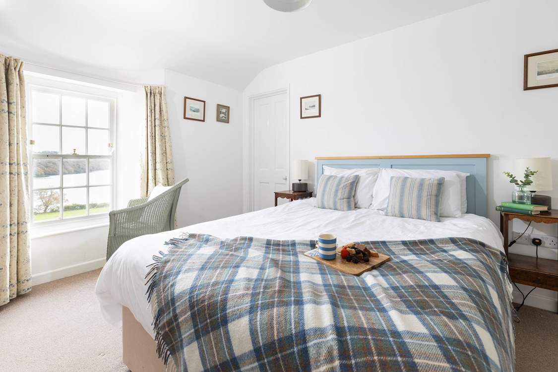 The main bedroom has a lovely king size bed to relax in and look at that view (Bedroom 1).