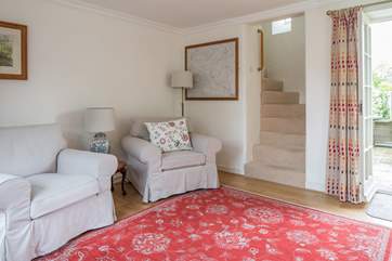 The beautiful spiral staircase leads from the sitting-room.