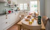 The stylish kitchen/dining-room leads out into the conservatory. - Thumbnail Image