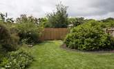 The garden is fully enclosed to keep little ones and dogs safe. Please note this high fence has been replaced with a picket fence and gate. - Thumbnail Image