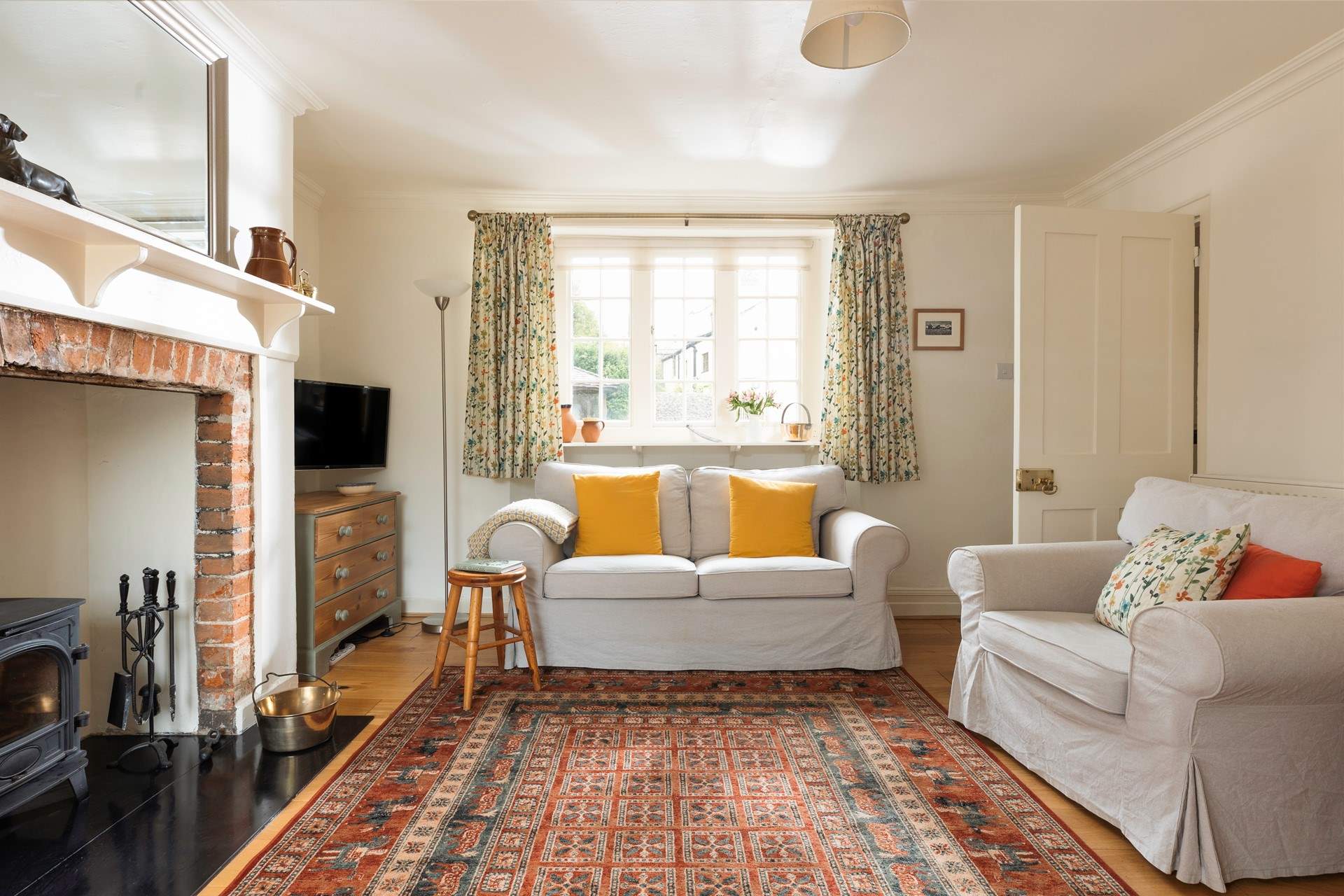 A lovely light bright and spacious sitting-room.