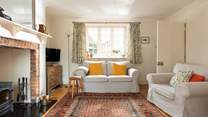 A lovely light bright and spacious sitting-room.