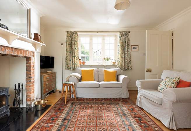 A lovely light bright and spacious sitting-room.