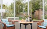 The conservatory looks out over the enclosed south-west facing garden. - Thumbnail Image