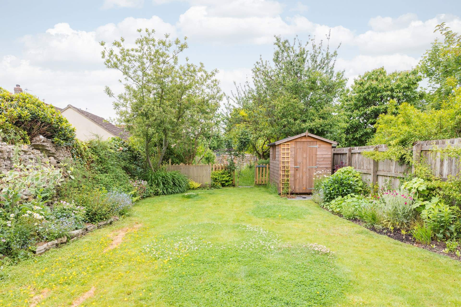 The tranquil garden is completely enclosed.