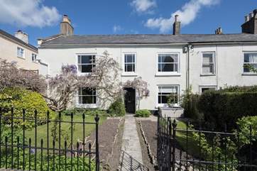 The Old Manor House is a 16th Century Grade II Listed family house set back from the road, with a fabulous garden behind the house.