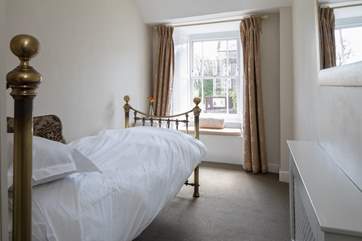 Bedroom 5, the little single room looks out over the church and has sea glimpses.