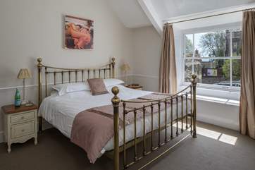 The master bedroom, bedroom 1, has this fabulous 6ft bed; all of the rooms are spacious and elegant with beautiful windows.