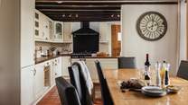 The kitchen has everything that you need for a family holiday or special occasion, with a range cooker and not one, but two dishwashers.