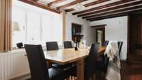 Perfect for family gatherings and celebrations, the large oak table seats 10.