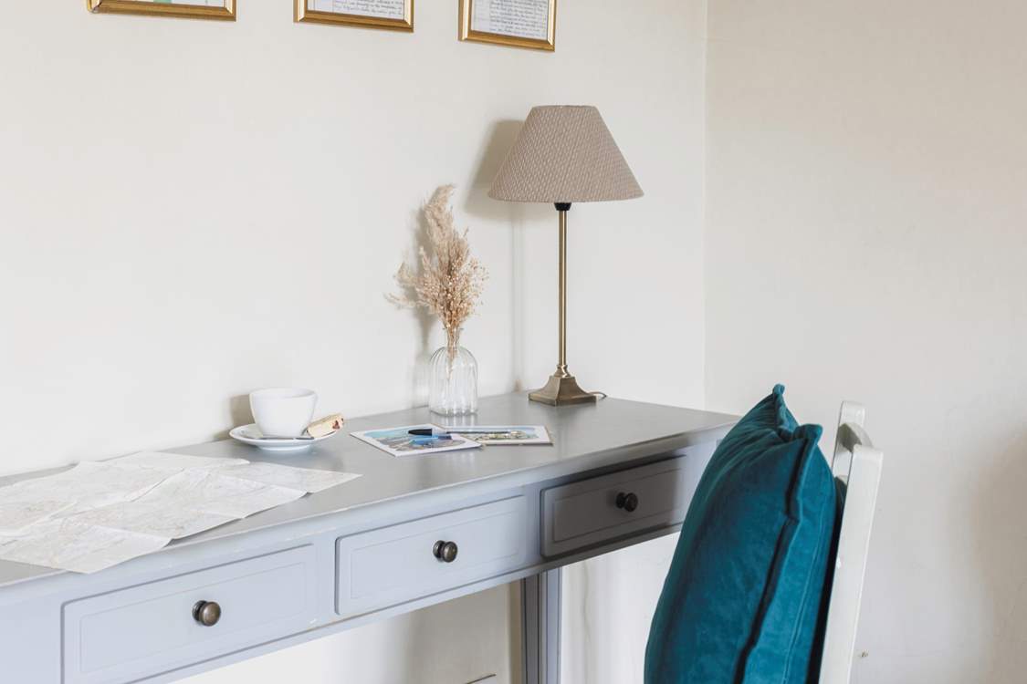 Pop into the snug to write a postcard or plan your next walk from the door!