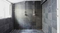 The ground floor wet-room has this great space for showering sandy children and adults after a day on the beach.