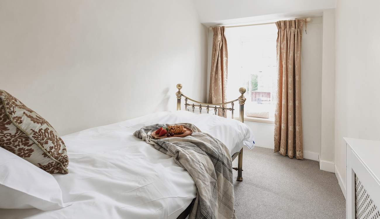 Bedroom 5, the little single room looks out over the church and has sea glimpses.