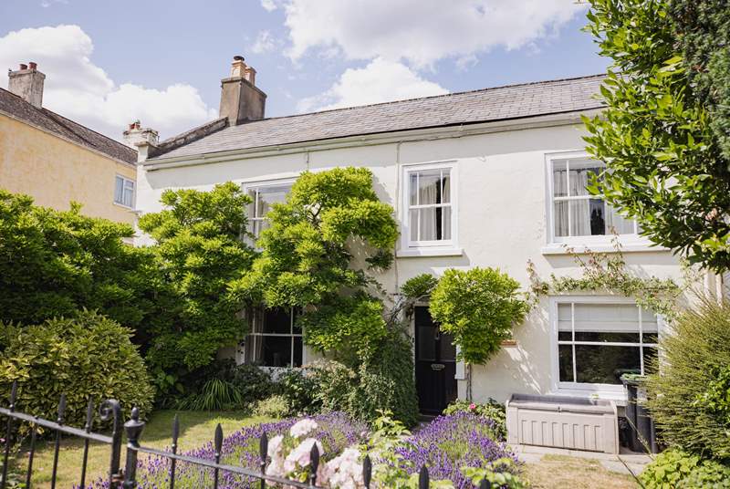 This elegant house is set back from the main street that runs through the village of Charmouth.