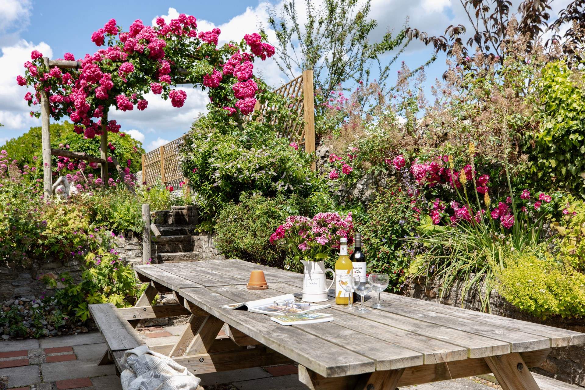 The beautiful gardens stretch way back behind the house.