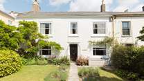 The Old Manor House is a 16th Century Grade II Listed family house set back from the road, with a fabulous garden behind.