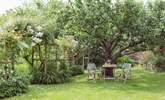 A shady spot set in a classic English garden. - Thumbnail Image