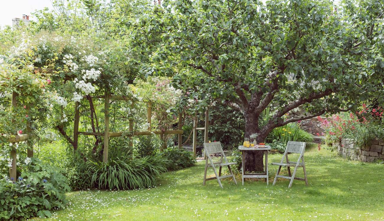 A shady spot set in a classic English garden.