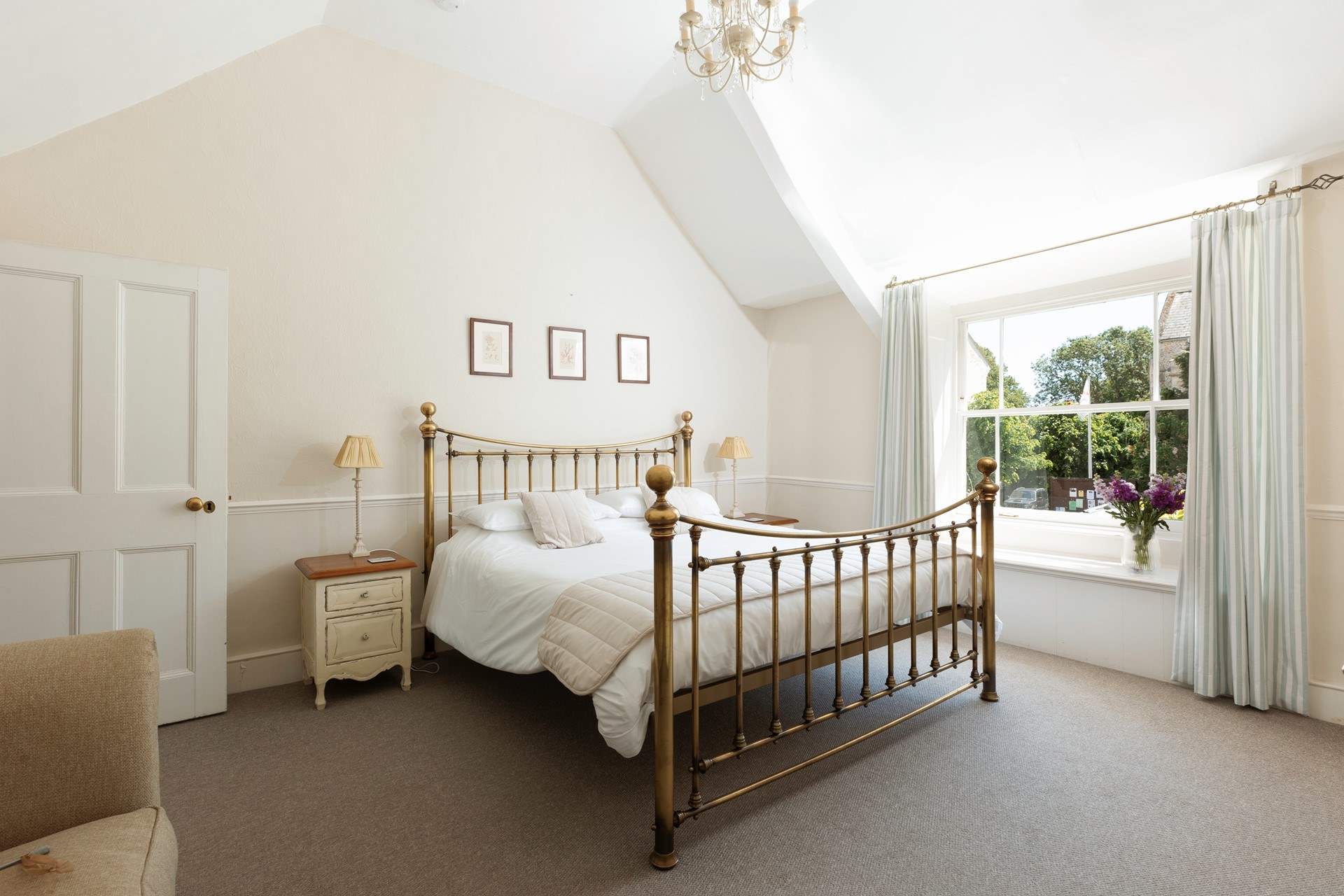 The main bedroom, bedroom 1, has this fabulous 6ft bed; all of the rooms are spacious and elegant with beautiful windows.