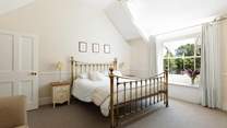 The main bedroom, bedroom 1, has this fabulous 6ft bed; all of the rooms are spacious and elegant with beautiful windows.