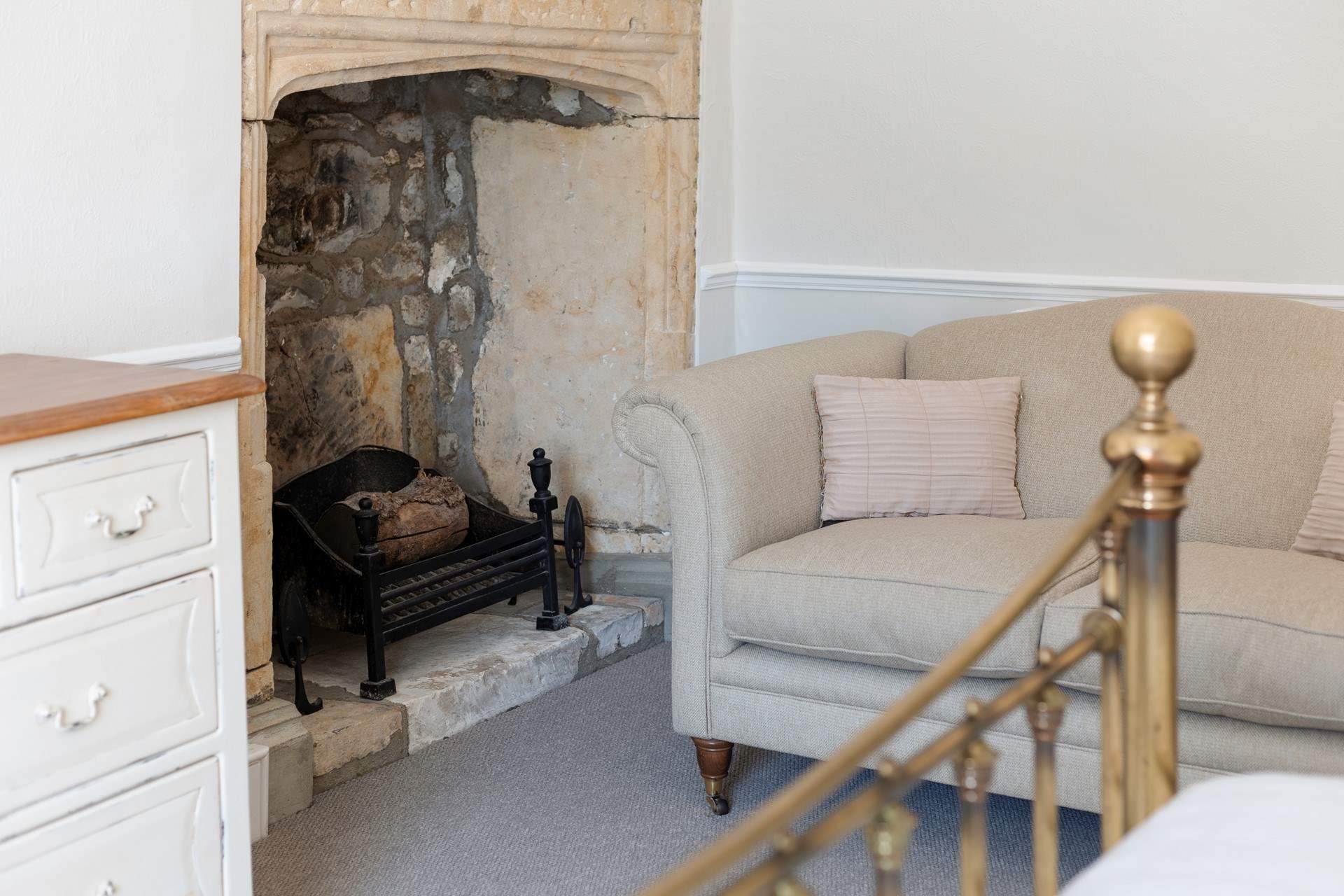 Stunning original features are found all around the property. This beautiful fireplace is in the main bedroom.