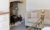 Stunning original features are found all around the property. This beautiful fireplace is in the main bedroom. - Thumbnail Image