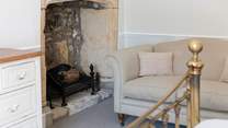 Stunning original features are found all around the property. This beautiful fireplace is in the main bedroom.
