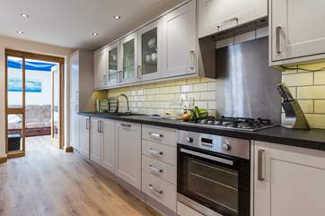 The sociable eat in kitchen is a lovely place to spend time together.