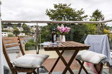 The balcony is a lovely spot to catch the evening sun.