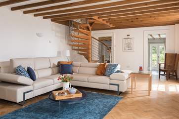 Sink down into the Italian leather sofa.