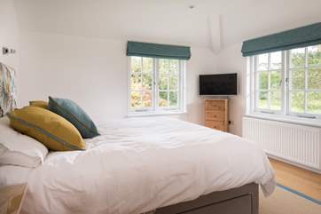 The Westwing Bedroom is flooded with light (Bedroom 1).