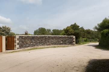 The gate leads into the courtyard at Chygowlin House, turn right at the end of the drive to the private parking.