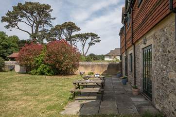 The enclosed garden of Hobnob, faces the south west and catches the sun all day.