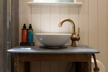 The slate top stand with sink finishes this area perfectly.