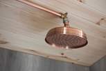 With bespoke copper fittings.
