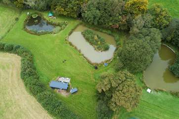 Here you can see this secluded location, with the shepherd's hut and barbecue hut nestled into their own spots.