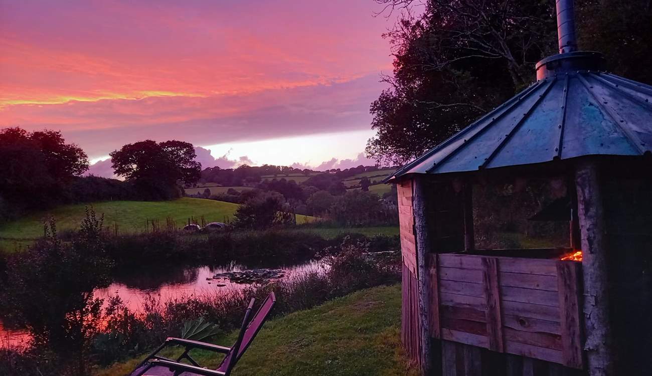 Take in those breathtakingly beautiful, sunset skies by the warmth of the fire.