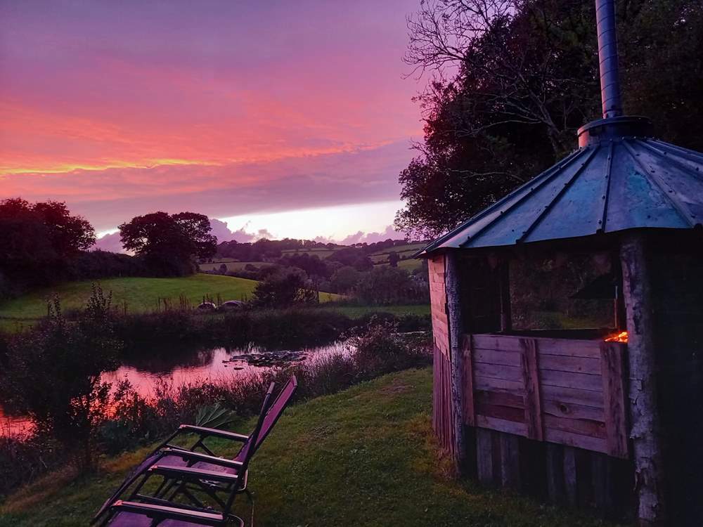 Take in those breathtakingly beautiful, sunset skies by the warmth of the fire.