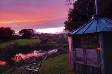 Take in those breathtakingly beautiful, sunset skies by the warmth of the fire.