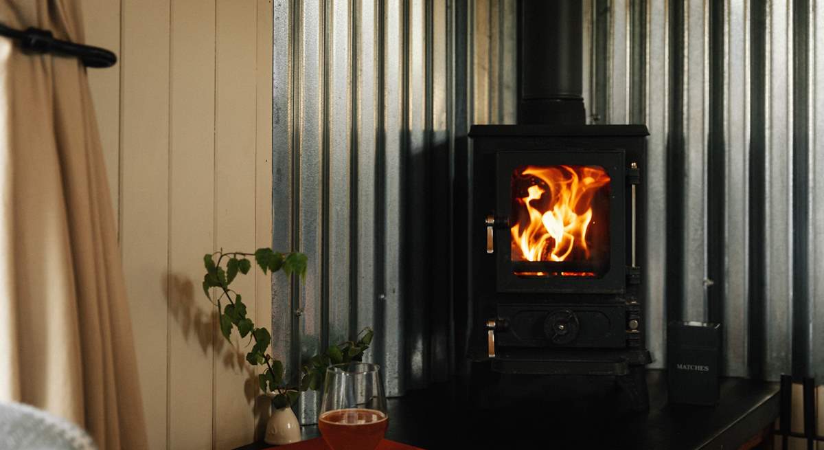 On cooler days get cosy by the wood burner. 